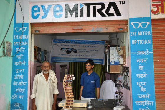 An Eye Mitra stood in his practice with a patient